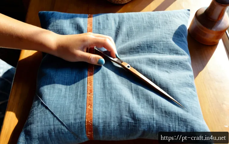 Home 17 수공예 베개 커버 만들기 - Photorealistic overhead view of a Portuguese home craft table, adult hands sewing a handmade linen p...