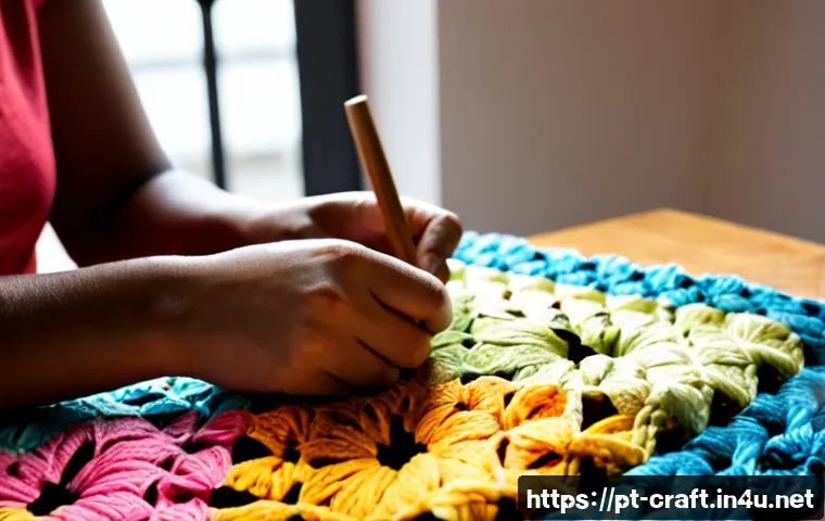 Home 17 수공예 크로셰 - Photorealistic close-up of skilled hands crocheting a soft cotton granny-square blanket in vivid tro...
